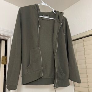 Primary size 10 green zip up